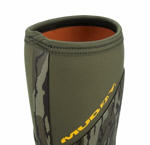 Top view of camo-patterned rubber boot with logo