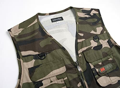 Camouflage tactical vest with multiple pockets.